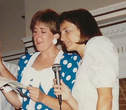 two women with microphone
