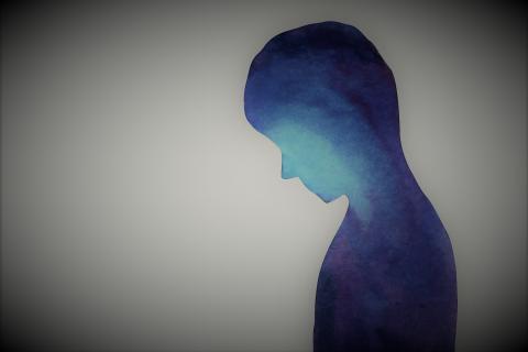Blue cutout of boy in shadows