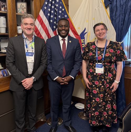 three people in legislative office