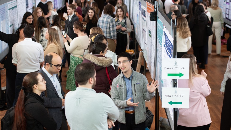 people standing around posters