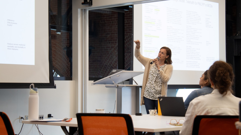 Participant presenting a project developed during the Foundational Implementation Science Bootcamp.